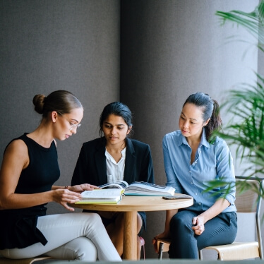 A team looking through documents