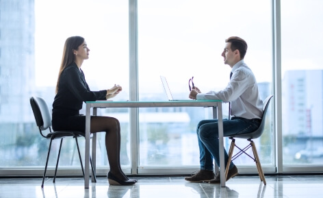 Two employees talking to each other