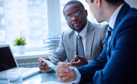 Two employees talking to each other