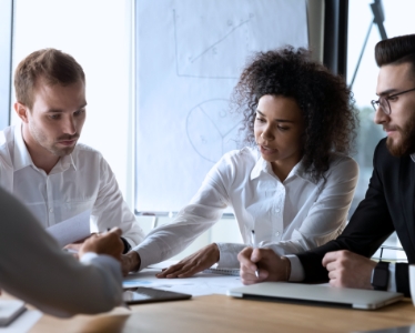 Two employees talking face to face